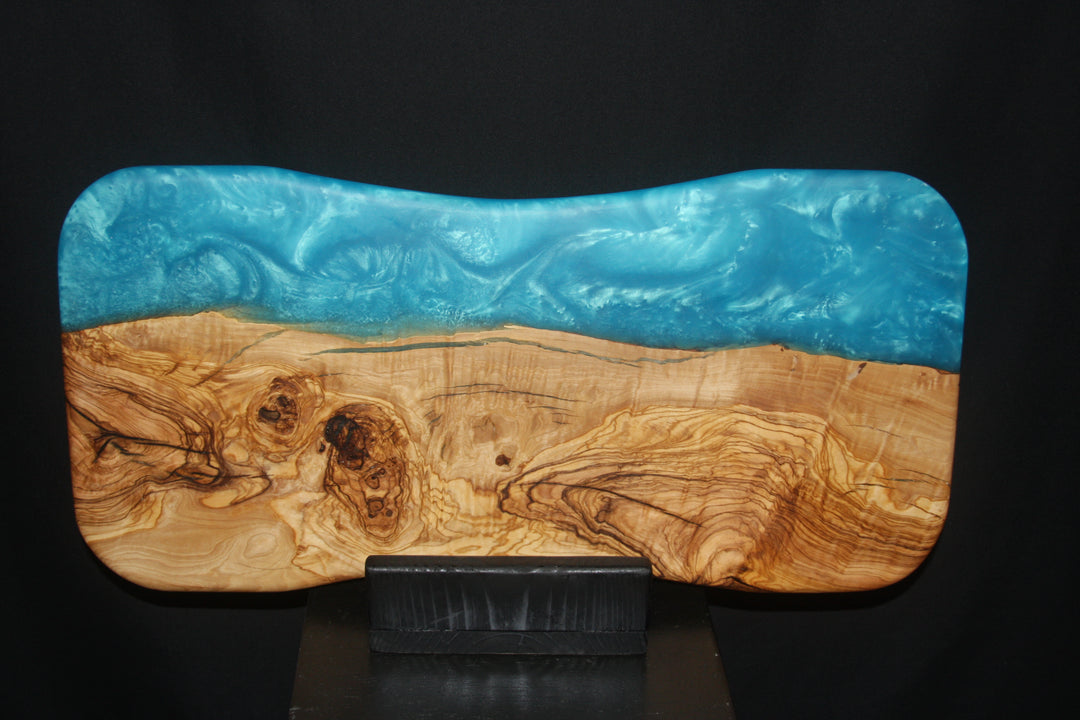 Ancient Old Growth Olivewood Burl with Turquoise swirling epoxy charcuterie/serving board