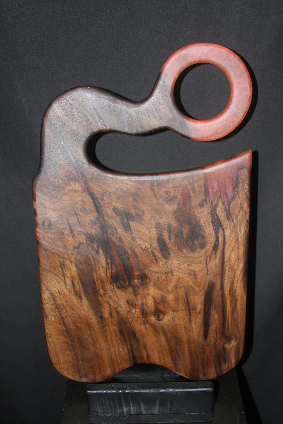 Highly figured claro walnut with dragons blood red epoxy resin charcuterie board