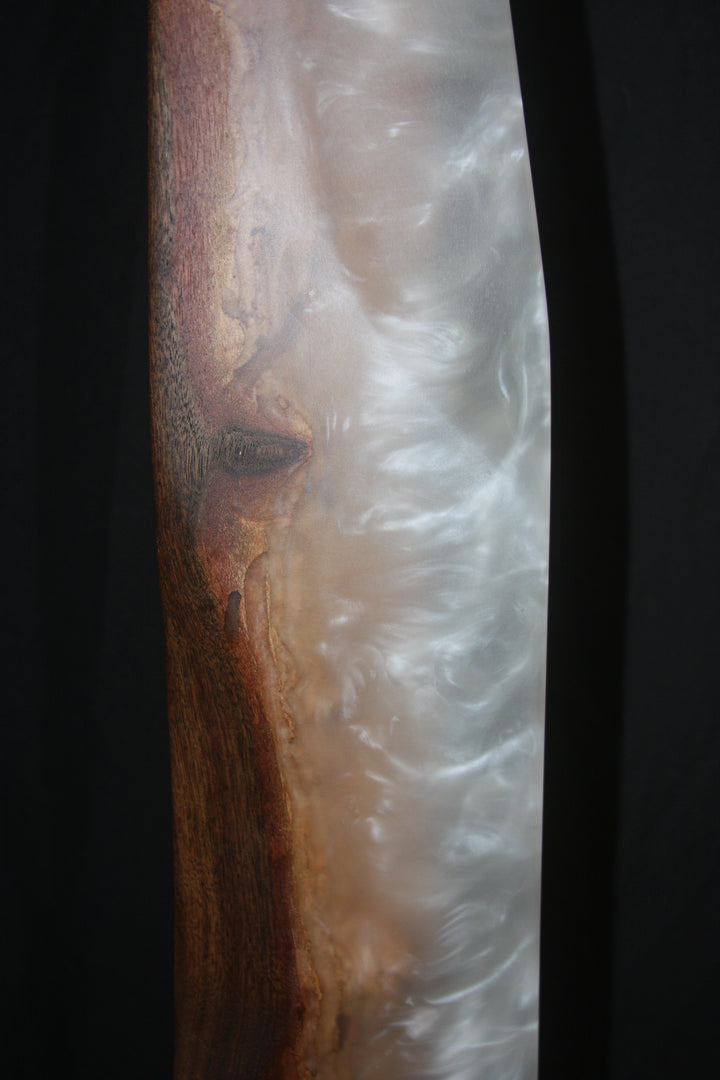 Live edge claro walnut with cloudy white spire sculpture