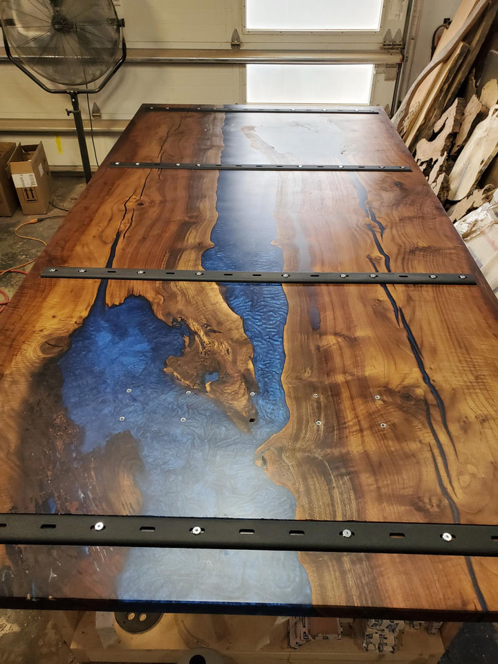Highly figured large claro walnut with blue blood epoxy resin conference table